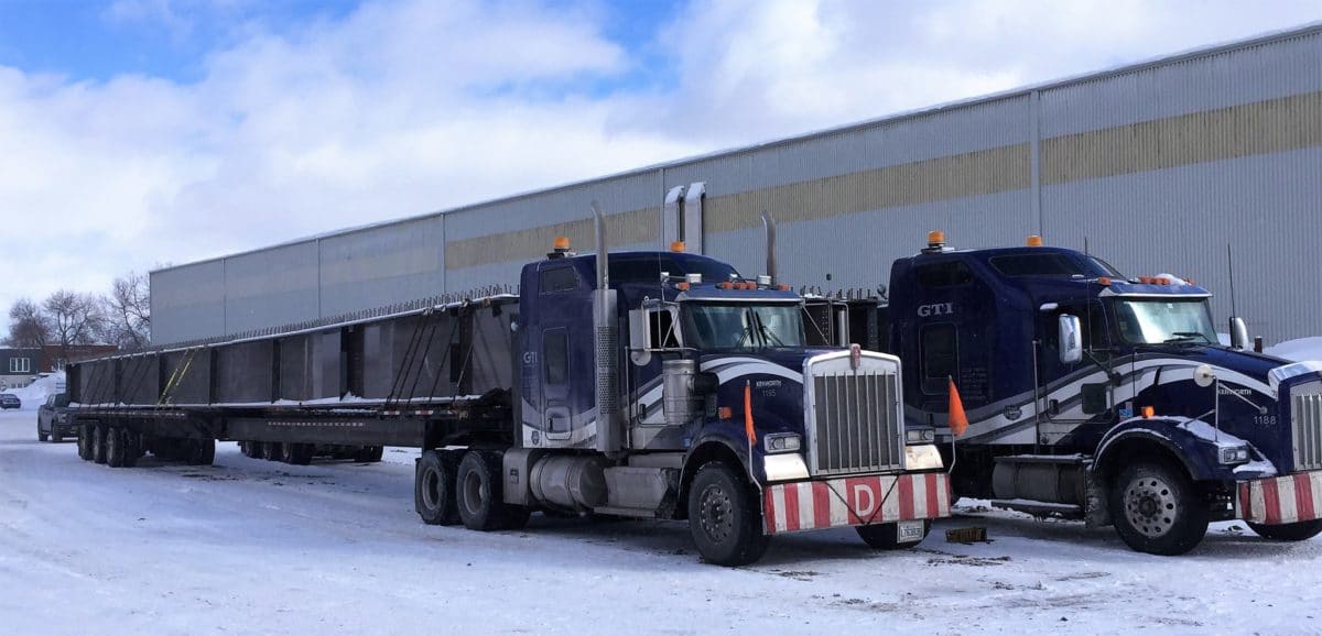 Bridge beams transport by truck